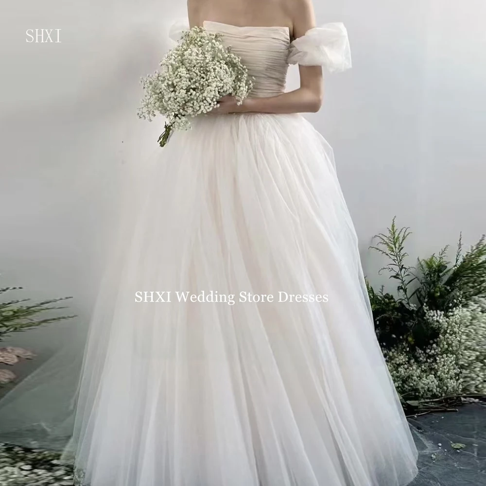 SHXI Latest Dreamy One shoulder Wedding Dress 웨딩드레스 Soft Tulle Floor length Bridal Gown Princess Wed ding Photo Custom made
SHXI Latest Dreamy One shoulder Wedding Dress 웨딩드레스 Soft Tulle Floor length Bridal Gown Princess Wed ding Photo Custom made