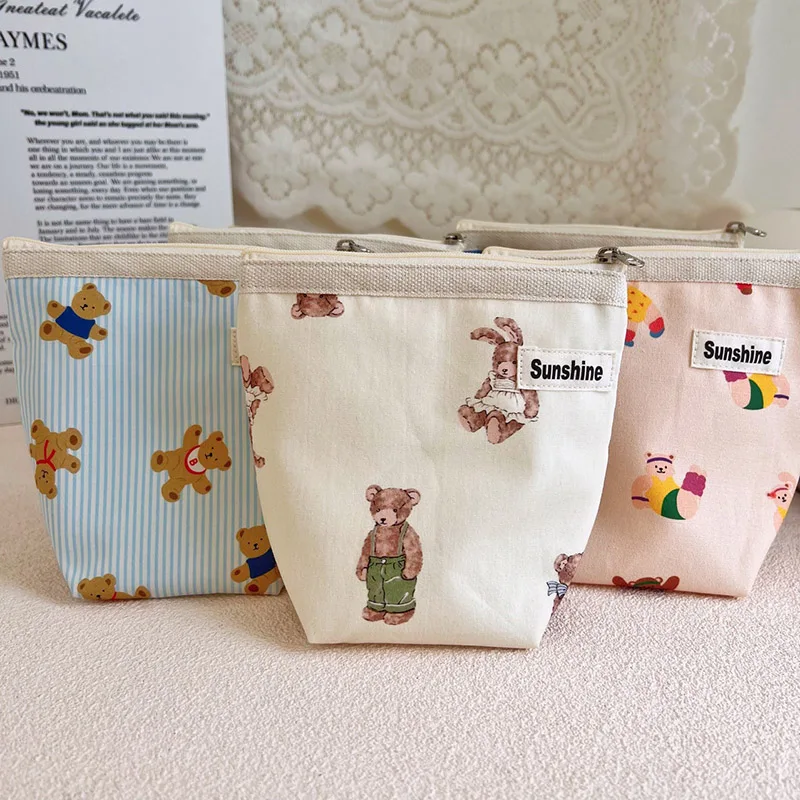 2025 Cartoon bear printed cotton makeup bags lipstick perfume storage bags daily household storage bags factory wholesale
2025 Cartoon bear printed cotton makeup bags lipstick perfume storage bags daily household storage bags factory wholesale