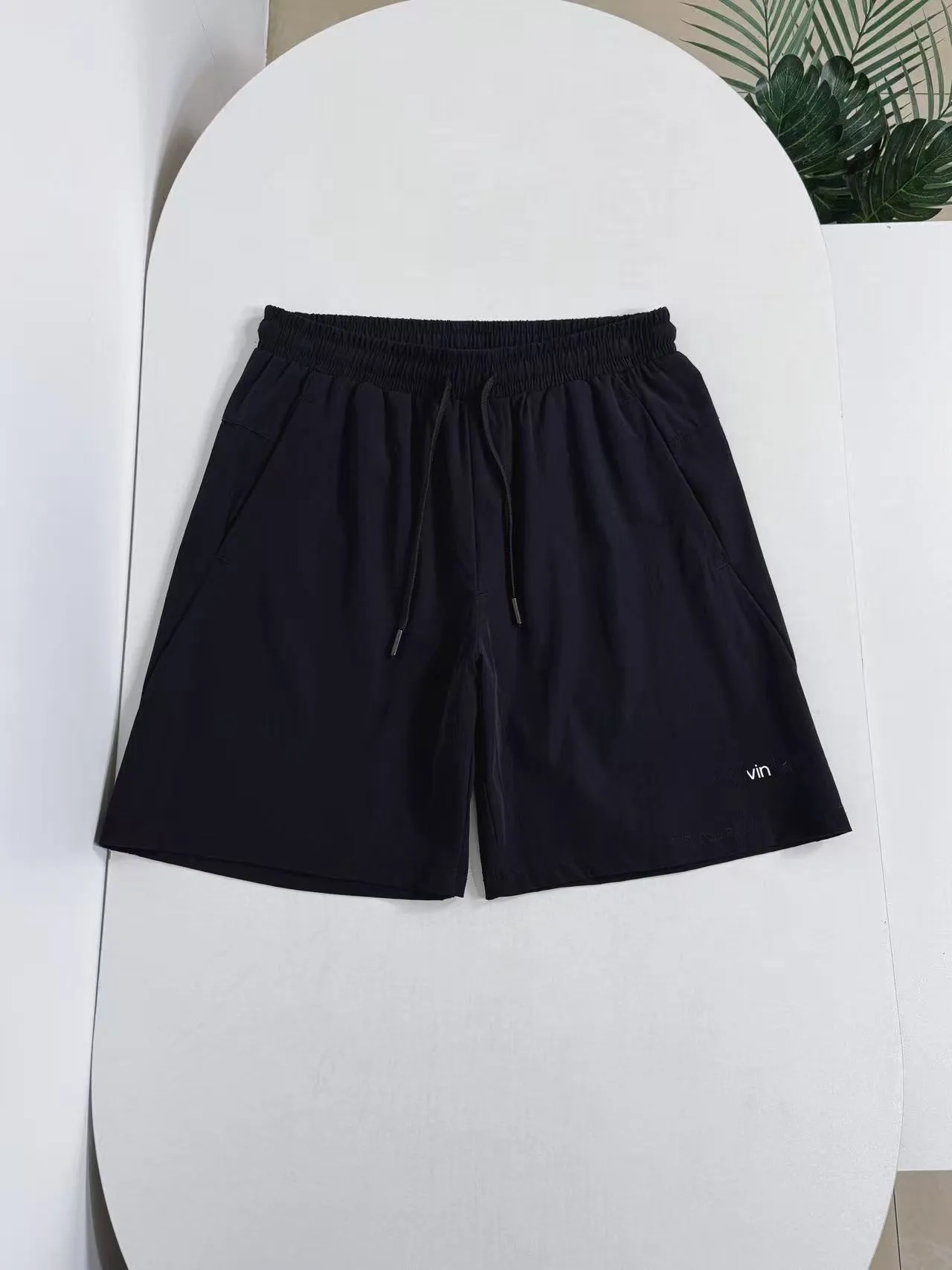 High-End Fashion Letter Print Lightweight Quick-Dry Breathable Elastic Waist Running Fitness Sports Shorts for Men
High-End Fashion Letter Print Lightweight Quick-Dry Breathable Elastic Waist Running Fitness Sports Shorts for Men