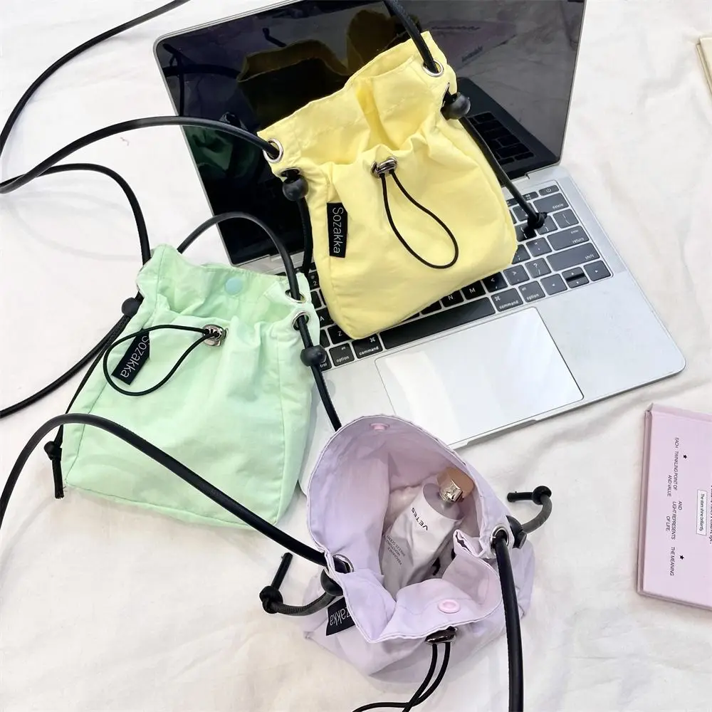 Casual Korean Style Drawstring Canvas Bag Purse Crossbody Bag Nylon Shoulder Bag Wallet Bags Solid Color Mobile Phone Bag Women
Casual Korean Style Drawstring Canvas Bag Purse Crossbody Bag Nylon Shoulder Bag Wallet Bags Solid Color Mobile Phone Bag Women