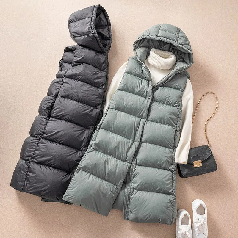 2023 Autumn Winter Women Hooded Waistcoat Warm Thick White Duck Down Vest Loose Bigsize Parkas Female Sleeveless Long Tank Coat
2023 Autumn Winter Women Hooded Waistcoat Warm Thick White Duck Down Vest Loose Bigsize Parkas Female Sleeveless Long Tank Coat