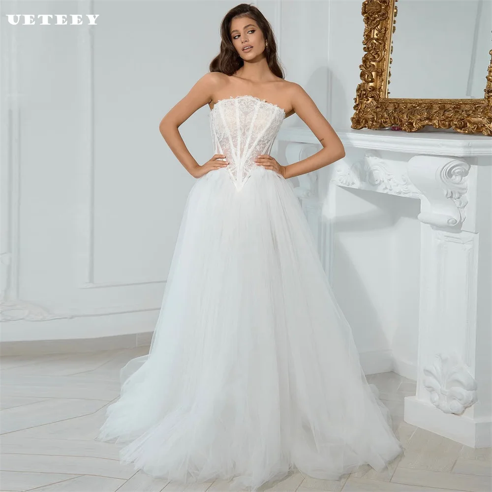 UETEEY Customized Elegant Lace Tulle Strapless A Line Wedding Dress For Women Lace Up Back Floor Length Bridal vestidos de novia
UETEEY Customized Elegant Lace Tulle Strapless A Line Wedding Dress For Women Lace Up Back Floor Length Bridal vestidos de novia