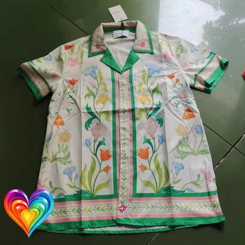 Colorful Floral Letters CASABLANCA Logo Short Sleeve Shirt Men Women Best Quality Hawaii Beach Holiday Surf Shirt Blouse
Colorful Floral Letters CASABLANCA Logo Short Sleeve Shirt Men Women Best Quality Hawaii Beach Holiday Surf Shirt Blouse