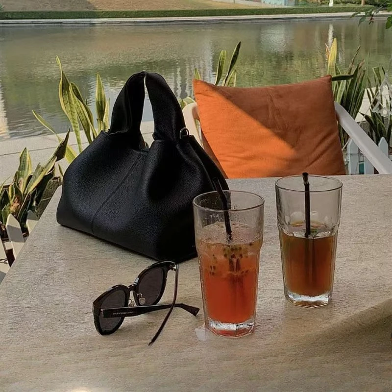 Cloud bag, genuine leather, light luxury, French niche dumpling bag, European and American retro high-end bag, women's bag
Cloud bag, genuine leather, light luxury, French niche dumpling bag, European and American retro high-end bag, women's bag