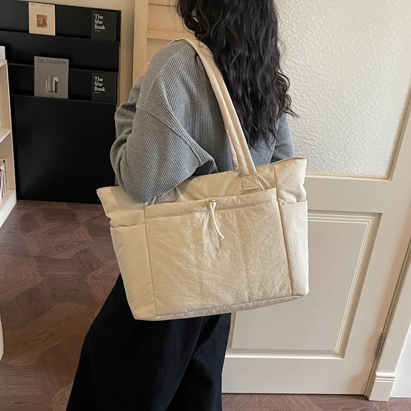 Korean large-capacity tote women's computer bag soft shoulder bag student portable waterproof and shock-resistant 16-inch note
Korean large-capacity tote women's computer bag soft shoulder bag student portable waterproof and shock-resistant 16-inch note