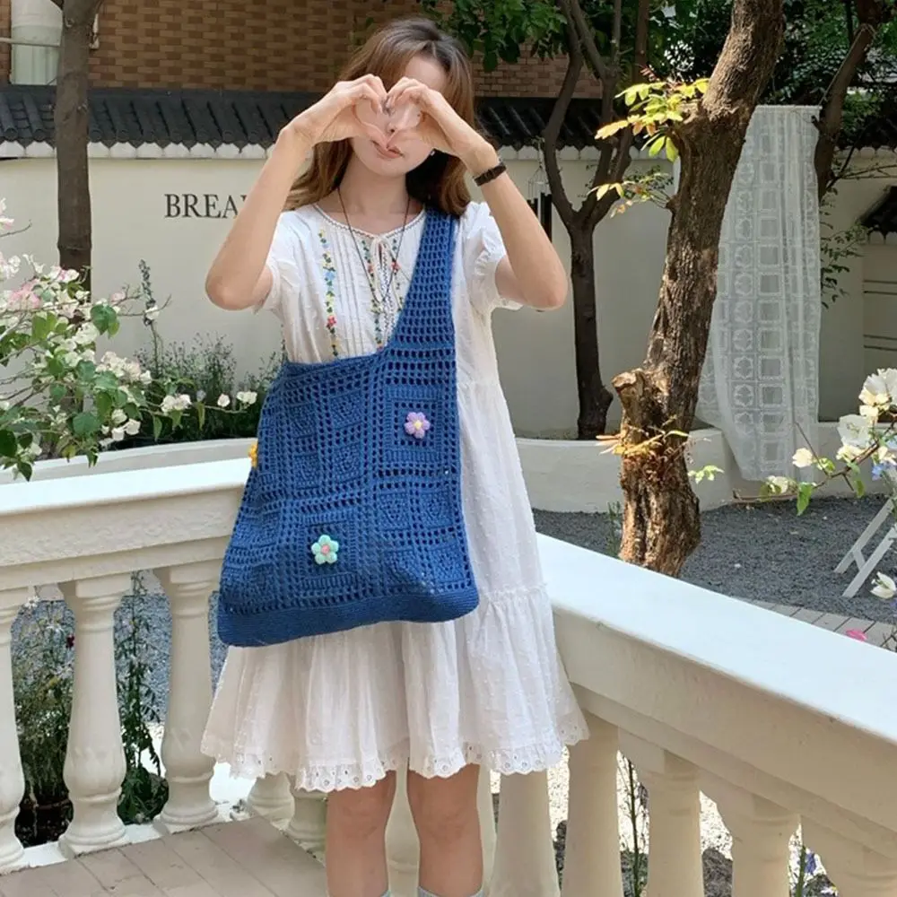 Fashion Hollow Knitted Tote Bag Large Capacity Handbag Hollow Shoulder Bag Breathable Bohemian Style Woven Beach Bag Female
Fashion Hollow Knitted Tote Bag Large Capacity Handbag Hollow Shoulder Bag Breathable Bohemian Style Woven Beach Bag Female