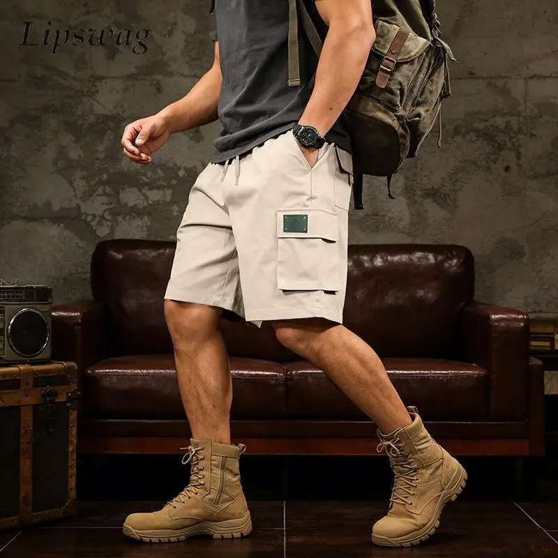 Стильные однотонные мужские шорты карго 2026 года, летние, для активного отдыха, повседневные, с множеством карманов, в стиле пэчворк, модные свободные шорты на шнуровке
Стильные однотонные мужские шорты карго 2026 года, летние, для активного отдыха, повседневные, с множеством карманов, в стиле пэчворк, модные свободные шорты на шнуровке