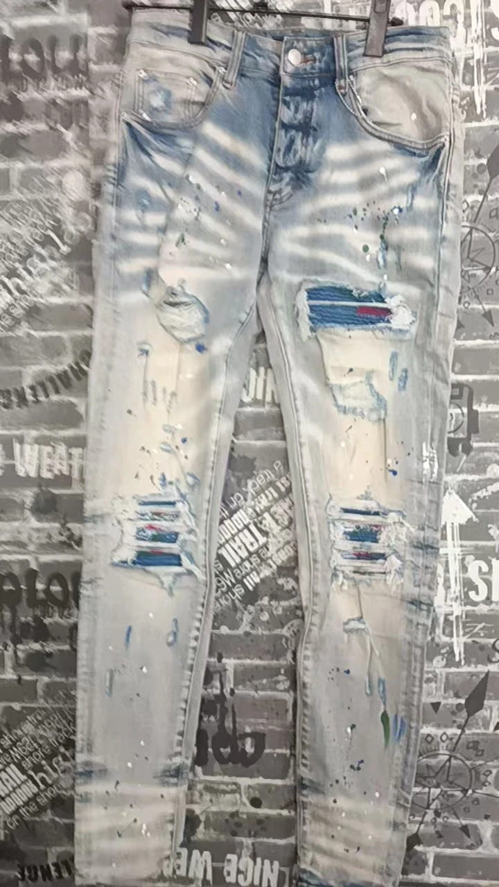 Fashionable new men's retro light blue jeans with pleated elastic perforated patch tight tapered pants Y2K
Fashionable new men's retro light blue jeans with pleated elastic perforated patch tight tapered pants Y2K