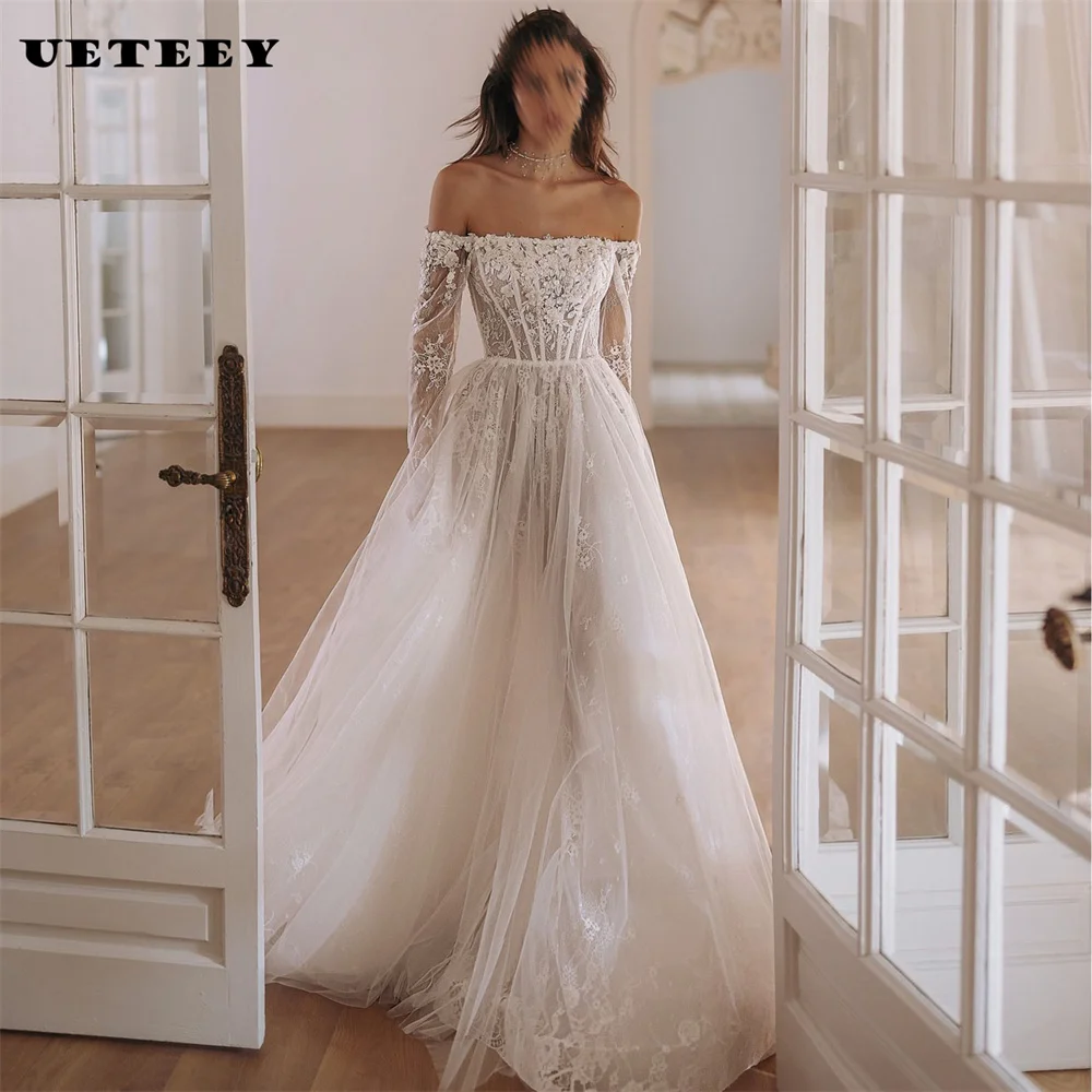 UETEEY Customized Appliques Off Shoulder Lace A Line Wedding Dress Illusion Lace Up Back Princess Court Train Bridal Gown
UETEEY Customized Appliques Off Shoulder Lace A Line Wedding Dress Illusion Lace Up Back Princess Court Train Bridal Gown
