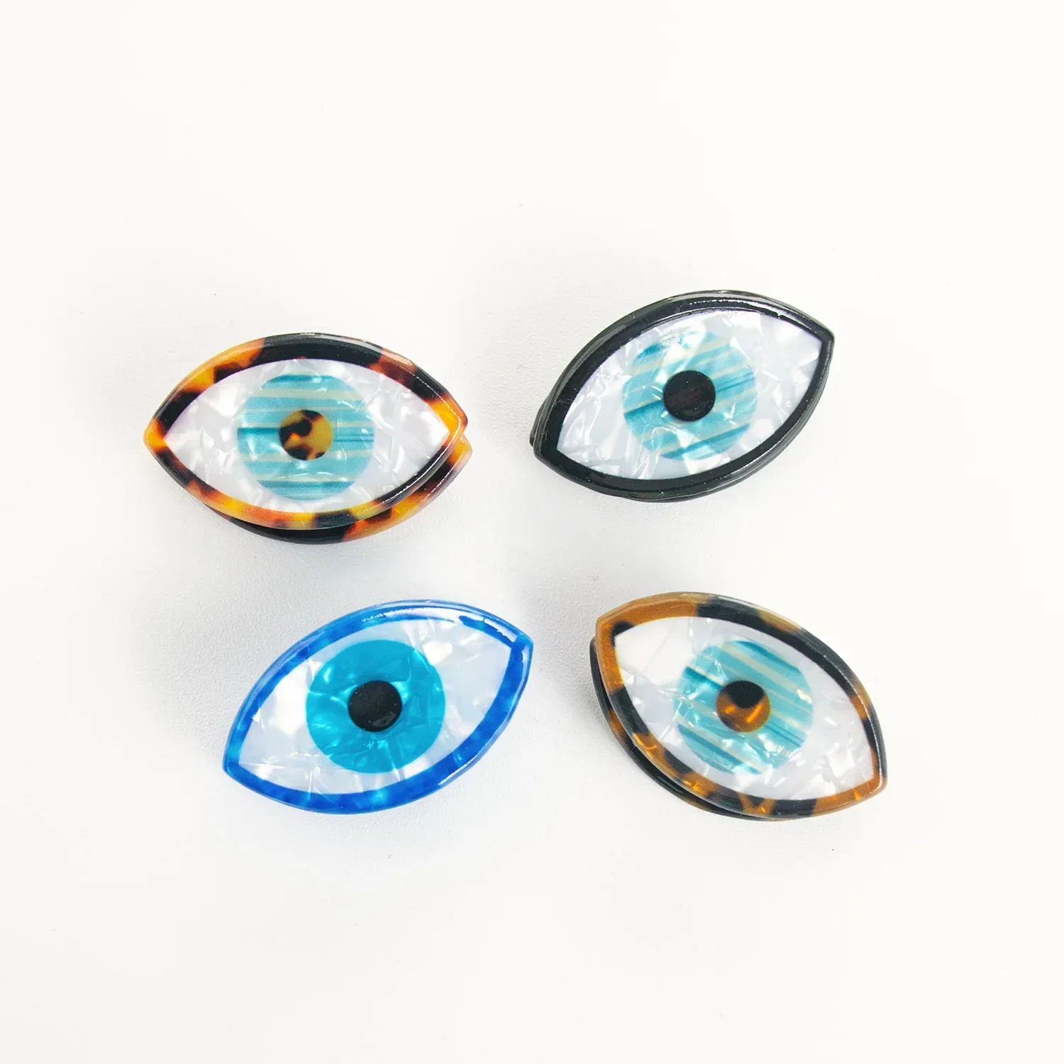 New Autumn and Winter Hot Selling Accessories PVC Material 3.6cm Headgear Clip Eye shape pattern design Gothic essentials
New Autumn and Winter Hot Selling Accessories PVC Material 3.6cm Headgear Clip Eye shape pattern design Gothic essentials