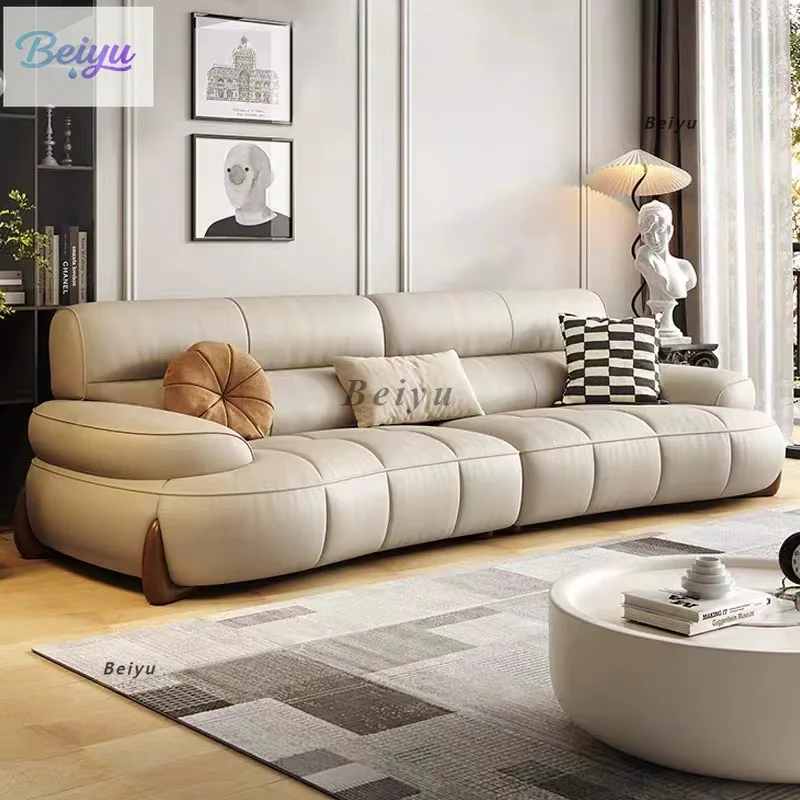 Light luxury post-modern minimalist cream style leather sofa size apartment living room sitting deep piano key curved leather so
Light luxury post-modern minimalist cream style leather sofa size apartment living room sitting deep piano key curved leather so