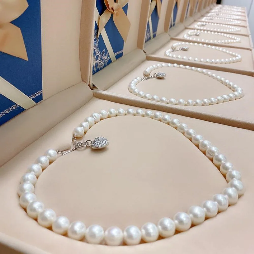18in 'Natural Pearl Necklace AAAA 9-10mm South Sea Round Pearl Necklace 925s Heart shaped Tail Buckle
18in 'Natural Pearl Necklace AAAA 9-10mm South Sea Round Pearl Necklace 925s Heart shaped Tail Buckle