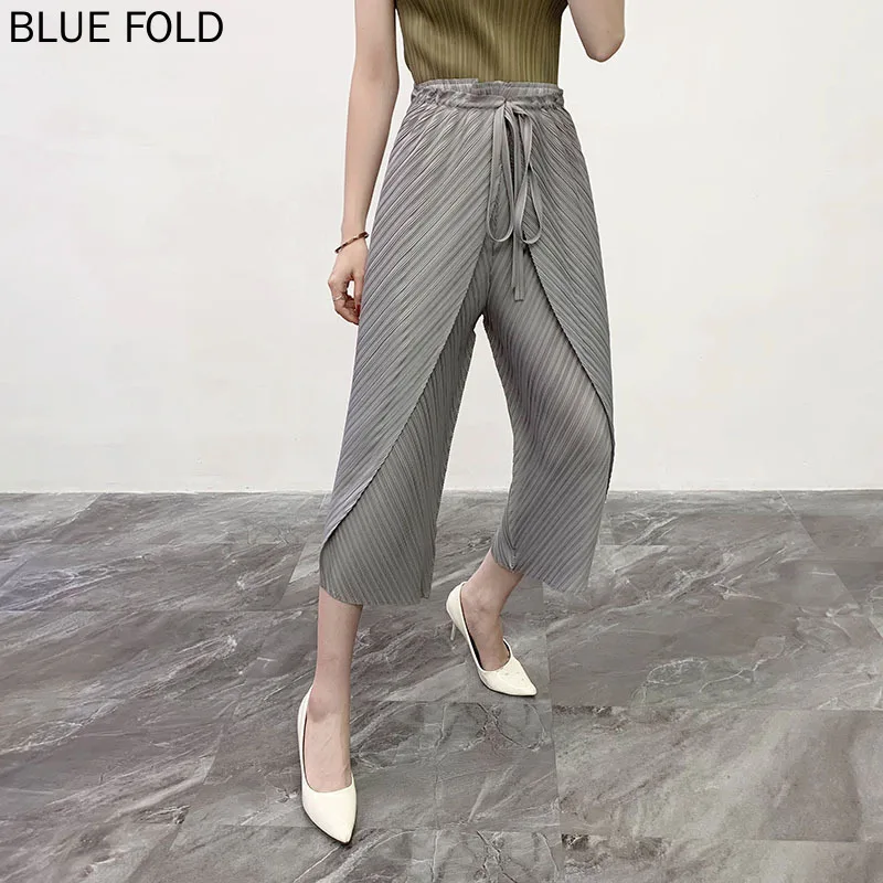 Summer New Classic Miyake Pleated Women's Original Strap Design Casual Pants Nine Points Wide Leg Pants Pleat
Summer New Classic Miyake Pleated Women's Original Strap Design Casual Pants Nine Points Wide Leg Pants Pleat