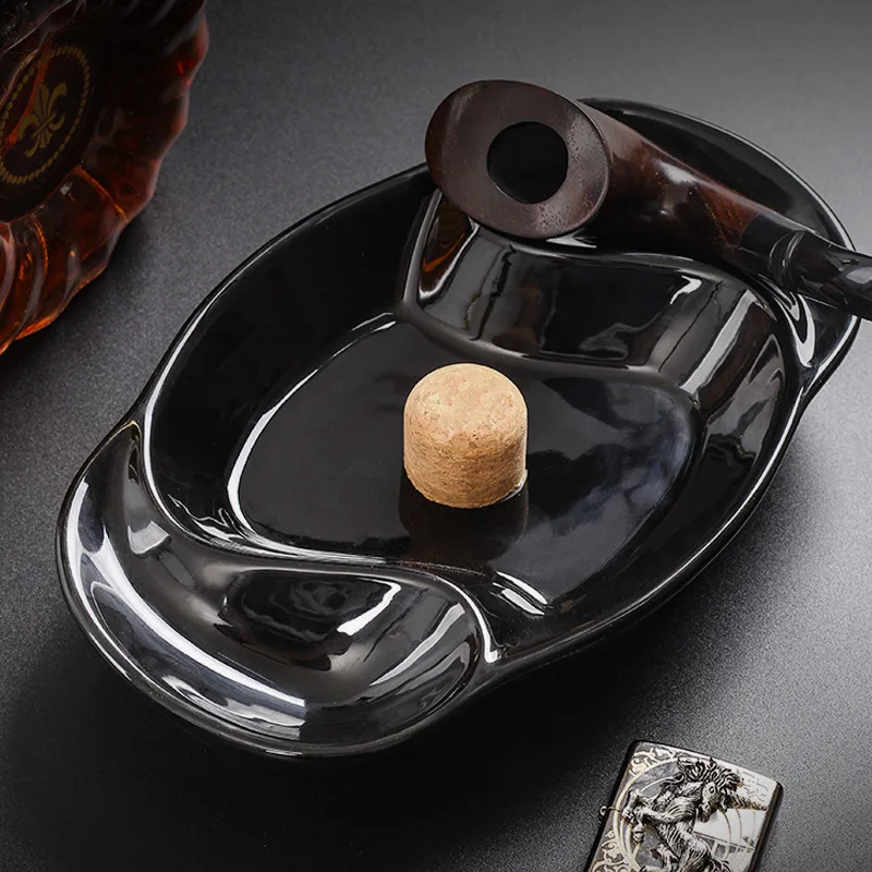 Black Ceramic Pipe Ashtray with Cork Knocker Creative Bone Holder for Home Ash Storage Tray Smoking Accessories
Black Ceramic Pipe Ashtray with Cork Knocker Creative Bone Holder for Home Ash Storage Tray Smoking Accessories