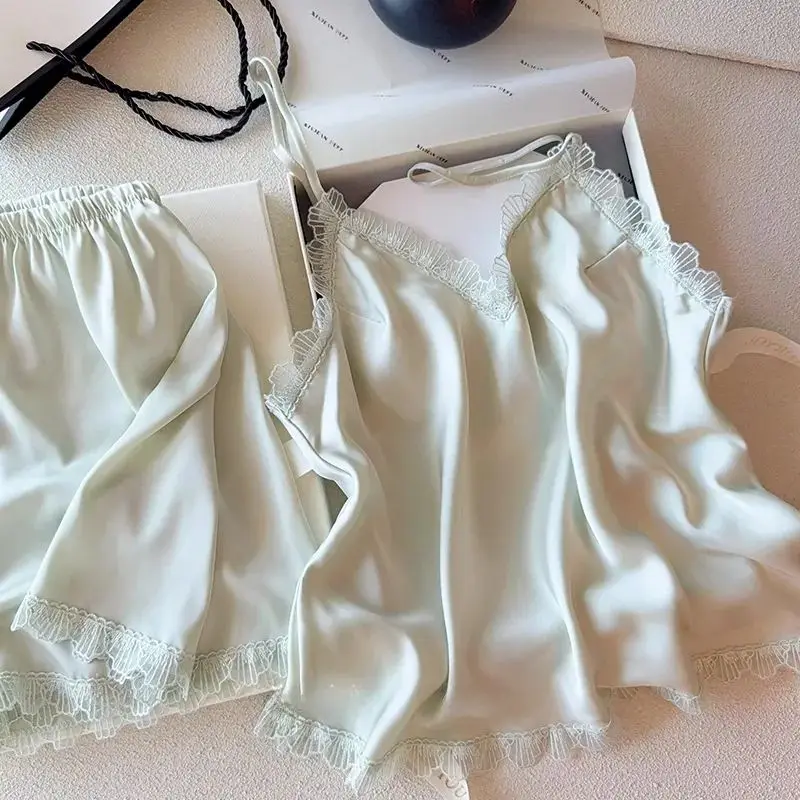 New Summer Pajamas Women's Ice Silk Suspender Suit Short Sleeve Shorts Sleepwear Lace Sexy Sweet Outerwear Home Clothes
New Summer Pajamas Women's Ice Silk Suspender Suit Short Sleeve Shorts Sleepwear Lace Sexy Sweet Outerwear Home Clothes
