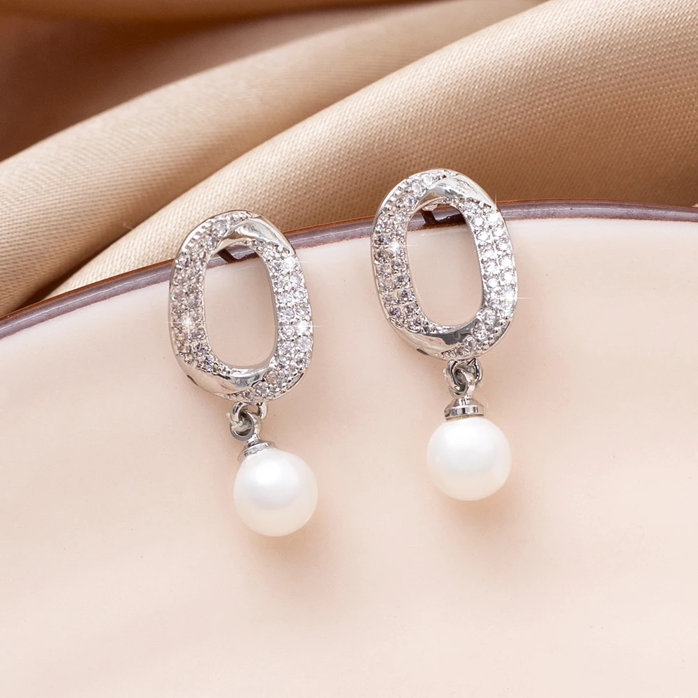 Fashion Imitation Pearl Zircon Earrings For Women Vintage Luxury Oval Dangle Drop Stud Earrings Trend 2025 Wedding Party Jewelry
Fashion Imitation Pearl Zircon Earrings For Women Vintage Luxury Oval Dangle Drop Stud Earrings Trend 2025 Wedding Party Jewelry