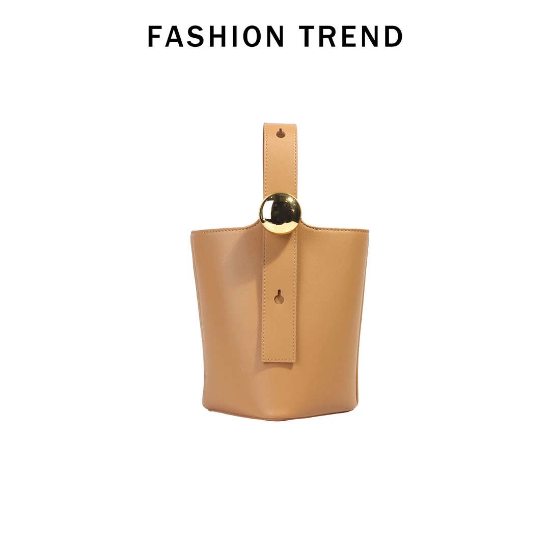 Mendy Bucket Bag Metal Ball Buckle Top Handle Crossbody Purse Artistic Design Detail Modern Minimalist Aesthetic Lightweight Chi
Mendy Bucket Bag Metal Ball Buckle Top Handle Crossbody Purse Artistic Design Detail Modern Minimalist Aesthetic Lightweight Chi