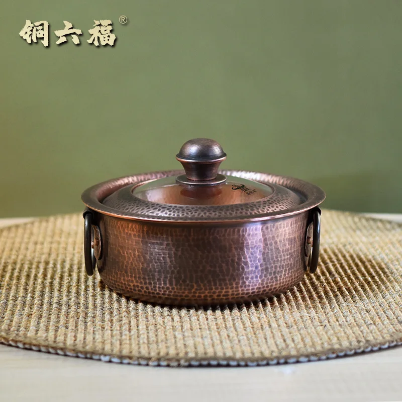 Thick handmade copper pot made of purple copper, specialized for induction cookers, vintage vintage single person hot pot
Thick handmade copper pot made of purple copper, specialized for induction cookers, vintage vintage single person hot pot