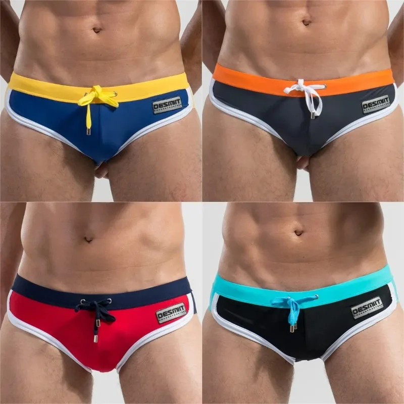 Summer Sexy Man's Brand Swimming Push-up Pad Swim Trunks Low Waist Swimming Briefs Swimwear Patchwork Color Beach Boxers
Summer Sexy Man's Brand Swimming Push-up Pad Swim Trunks Low Waist Swimming Briefs Swimwear Patchwork Color Beach Boxers