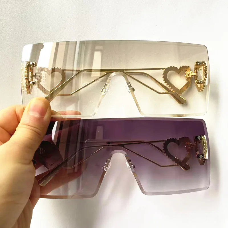 NEW Sun Glasses Women Rimless Eyeglasses Anti-UV Spectacles Heart DesignTemples Ornamental Adumbral Siamese Lens Sunglasses
NEW Sun Glasses Women Rimless Eyeglasses Anti-UV Spectacles Heart DesignTemples Ornamental Adumbral Siamese Lens Sunglasses