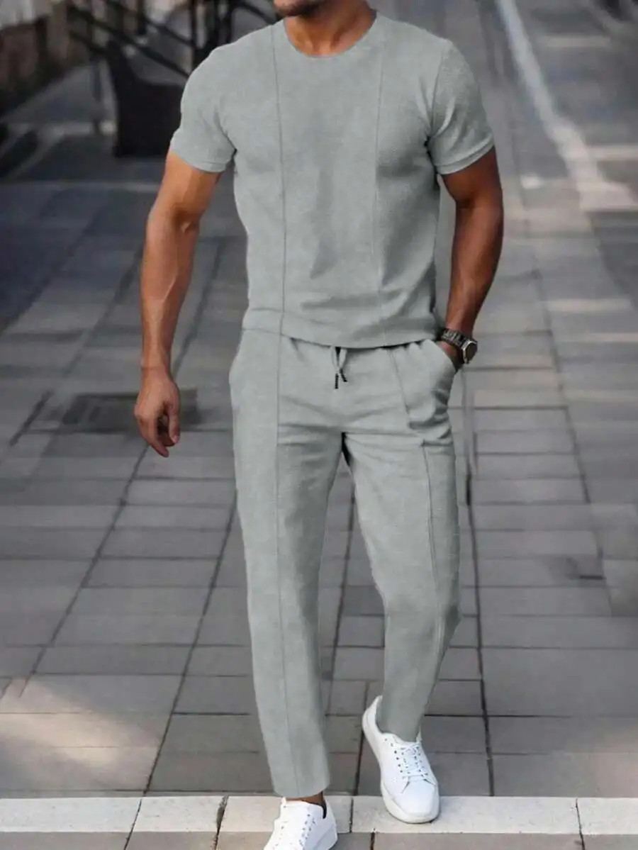 Men’s Light Gray Solid Round Neck Short Sleeve Tee With Drawstring Waist Jogger Pants Two-Piece Casual Set
Men’s Light Gray Solid Round Neck Short Sleeve Tee With Drawstring Waist Jogger Pants Two-Piece Casual Set