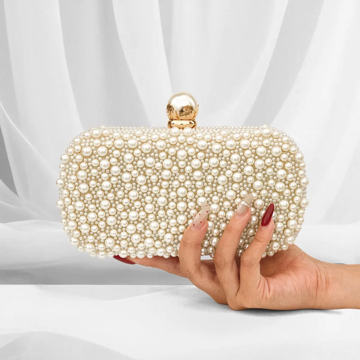 New pearl dinner bag, high-end clutch bag, wedding banquet chain, shoulder bag, women's bag.
New pearl dinner bag, high-end clutch bag, wedding banquet chain, shoulder bag, women's bag.
