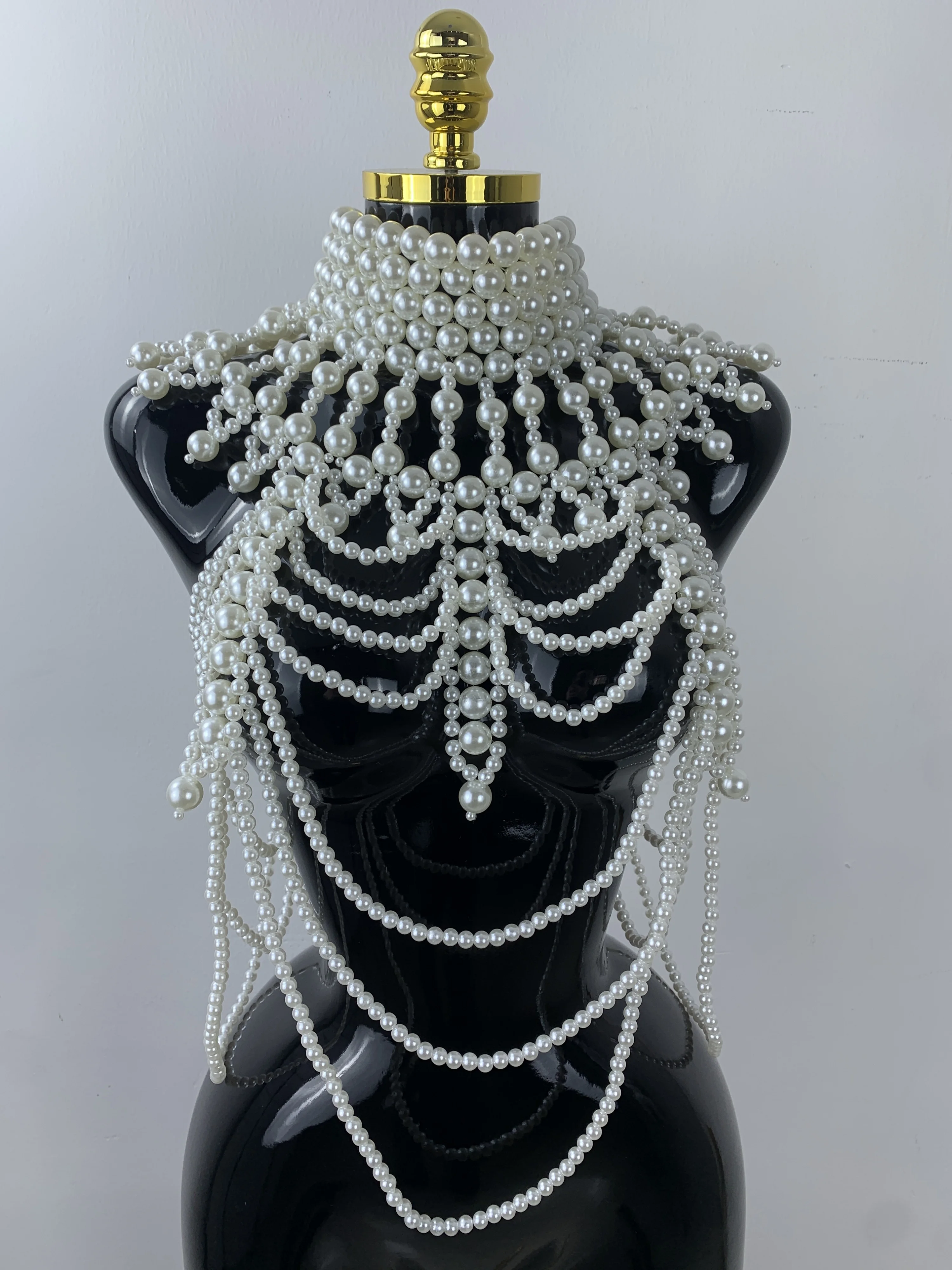 Женский плетеный белый жемчужный браслет-цепочка на тело, крупные бусины, эффектное украшение, бра-чокер, шаль на плечо, модное украшение для вечеринок, топ-камизоль
Женский плетеный белый жемчужный браслет-цепочка на тело, крупные бусины, эффектное украшение, бра-чокер, шаль на плечо, модное украшение для вечеринок, топ-камизоль