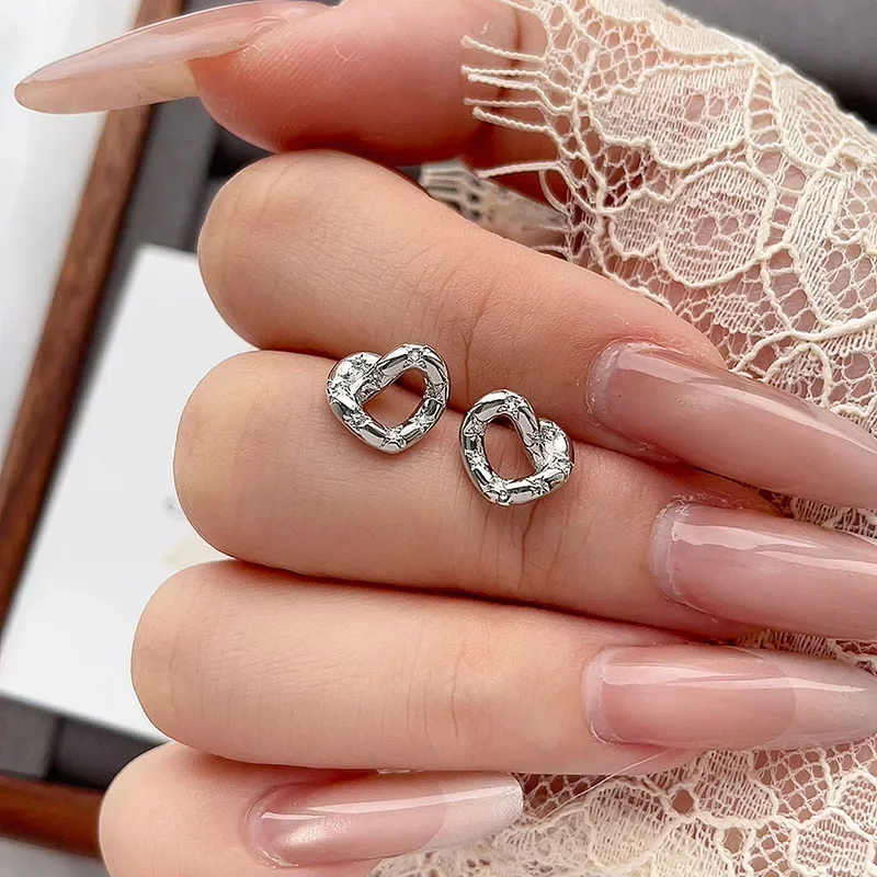 925 Sterling Silver Chic Geometric Zircon Hollow Heart Love Stud Earring for Women Fine Jewelry High Luxury Vintage Accessories
925 Sterling Silver Chic Geometric Zircon Hollow Heart Love Stud Earring for Women Fine Jewelry High Luxury Vintage Accessories