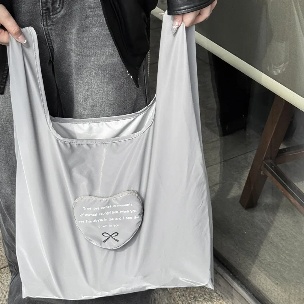 Portable Heart-Shaped Foldable Shopping Bag Silver Gray Large Capacity Eco-Friendly Reusable Grocery Bag Spacious Interior
Portable Heart-Shaped Foldable Shopping Bag Silver Gray Large Capacity Eco-Friendly Reusable Grocery Bag Spacious Interior