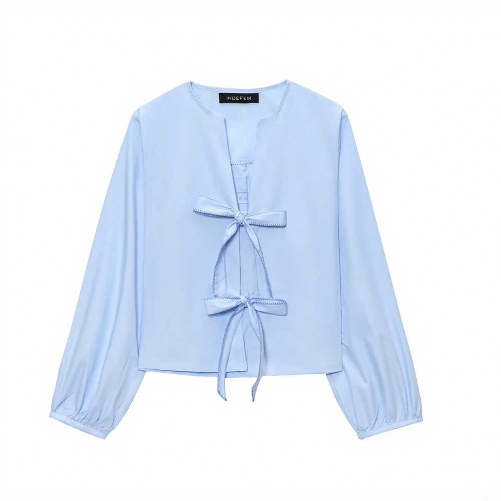 Женские рубашки, осень-зима, элегантная мода 2025 года, свободные однотонные повседневные рубашки с длинным рукавом и v-образным вырезом в виде бабочки
Женские рубашки, осень-зима, элегантная мода 2025 года, свободные однотонные повседневные рубашки с длинным рукавом и v-образным вырезом в виде бабочки