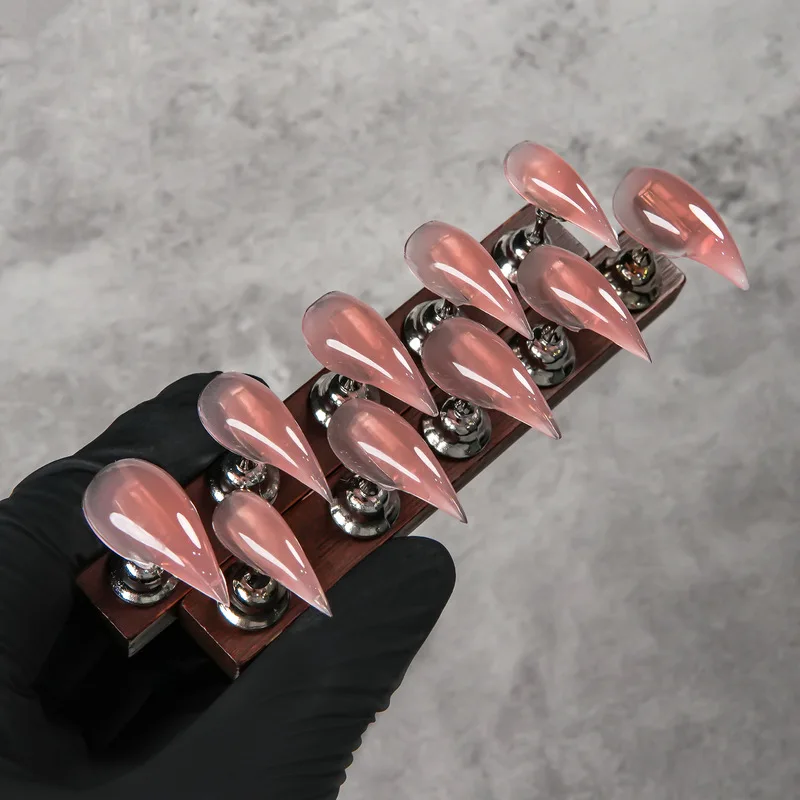European and American style translucent nude pink fake nails Extra-long pointed claw simple design Gentle
European and American style translucent nude pink fake nails Extra-long pointed claw simple design Gentle