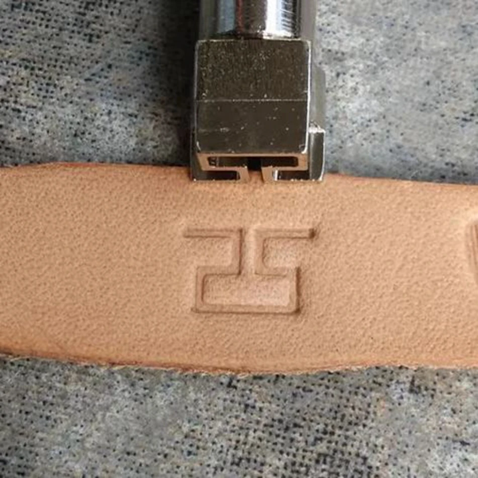 Leathercraft hardware tools, precision steel engraving and embossing tools, intricate decorative frame patterns.
Leathercraft hardware tools, precision steel engraving and embossing tools, intricate decorative frame patterns.