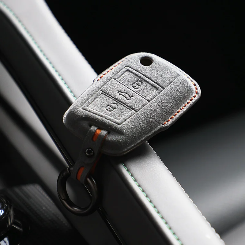 Alcantara Car Key Case Cover Holder Key Shell For VW Volkswagen Polo Lavida Bora Sagitar Tiguan Golf 7 Or Skoda Octavia Keychain
Alcantara Car Key Case Cover Holder Key Shell For VW Volkswagen Polo Lavida Bora Sagitar Tiguan Golf 7 Or Skoda Octavia Keychain