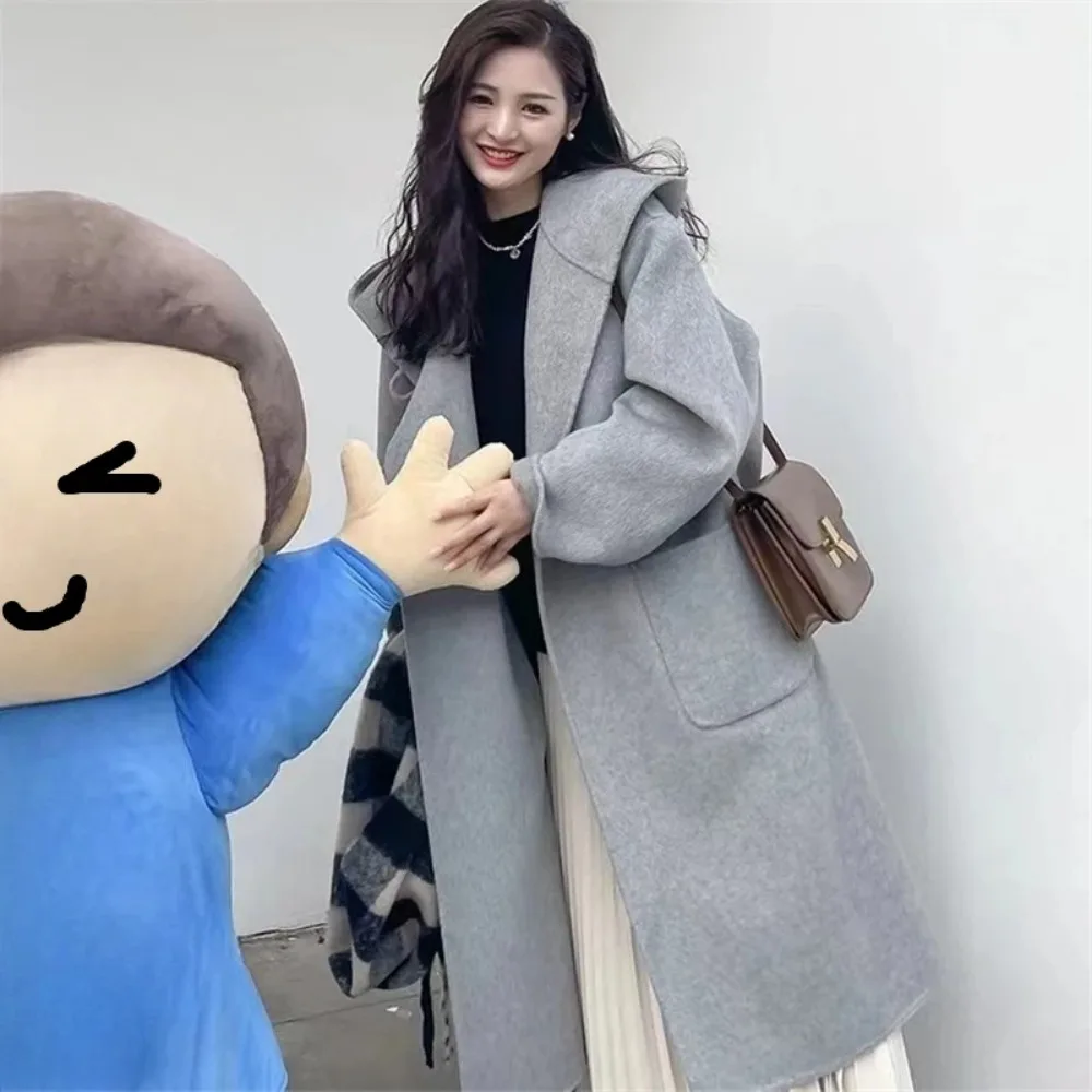 2024 Spring Autumn New Fashion Hooded Double-sided Cashmere Coat Women Long Loose Woolen Jacket Female Elegant Simple Wool Coat
2024 Spring Autumn New Fashion Hooded Double-sided Cashmere Coat Women Long Loose Woolen Jacket Female Elegant Simple Wool Coat