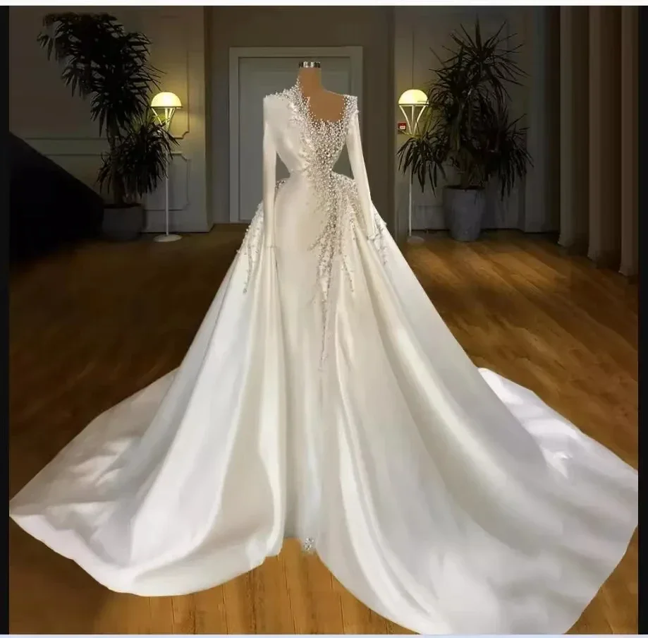 Customized Sparkly Pearls Long Sleeves Mermaid Wedding Dresses Overskirt Satin Real Photo Bridal Gowns Robes De Mariée
Customized Sparkly Pearls Long Sleeves Mermaid Wedding Dresses Overskirt Satin Real Photo Bridal Gowns Robes De Mariée