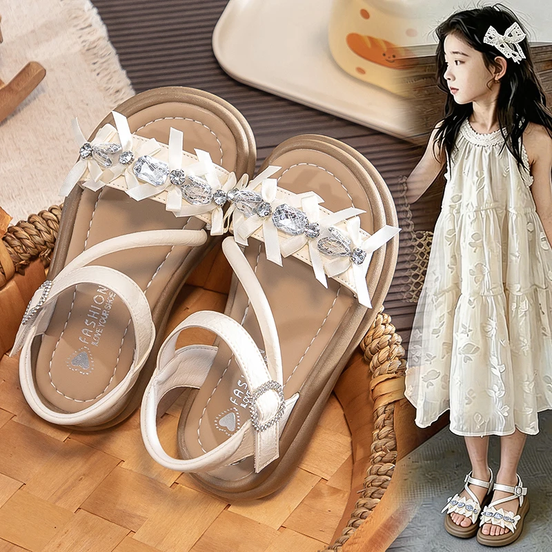 Girls Rhinestone Bow Leather Sandals 2026 New Summer Toddler Chunky Strappy Sandals Non-slip Trendy Princess Girls Beach Shoes
Girls Rhinestone Bow Leather Sandals 2026 New Summer Toddler Chunky Strappy Sandals Non-slip Trendy Princess Girls Beach Shoes