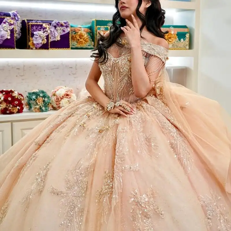 Customized champagne color Off Shoulder Quinceanera Dress sequin applique beads Tull Lace vestidos de 15 Quinceanera
Customized champagne color Off Shoulder Quinceanera Dress sequin applique beads Tull Lace vestidos de 15 Quinceanera 