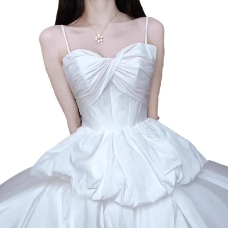 Платье для дня рождения, модный стиль 2026 года, элегантное и нишевое, с открытой спиной, белое, пышное, на бретельках, легкое свадебное платье
Платье для дня рождения, модный стиль 2026 года, элегантное и нишевое, с открытой спиной, белое, пышное, на бретельках, легкое свадебное платье