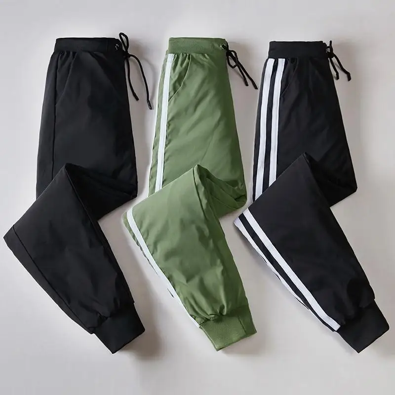 2024 New Warm Down Pants Fashion Slim Fit Double Sided High Waist Thickened Casual White Duck Down Work Dress Cotton Pants
2024 New Warm Down Pants Fashion Slim Fit Double Sided High Waist Thickened Casual White Duck Down Work Dress Cotton Pants