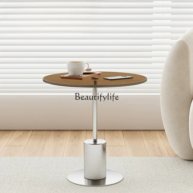 Living room sofa living room creative glass coffee table stainless steel rock slab light luxury small round table
Living room sofa living room creative glass coffee table stainless steel rock slab light luxury small round table