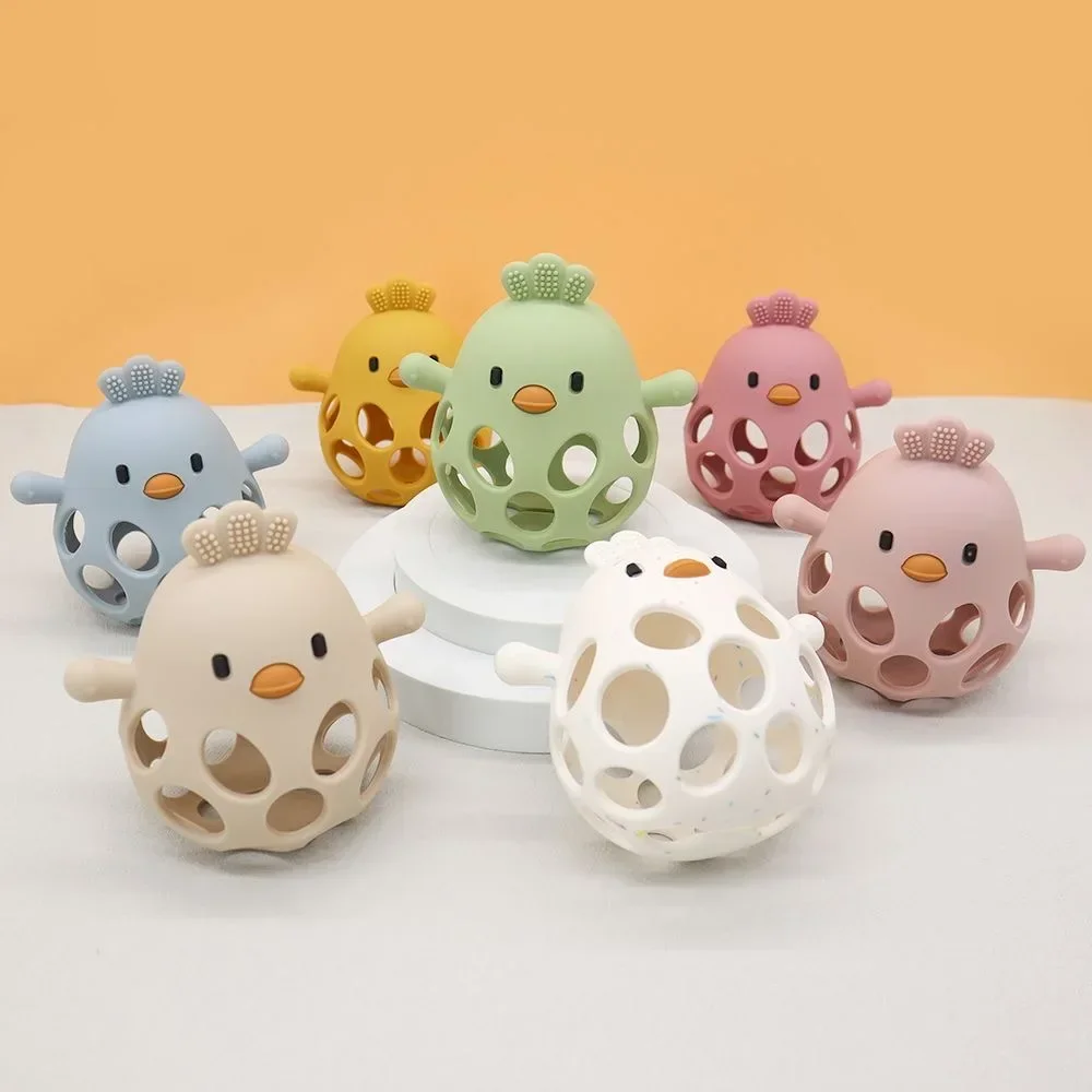 1PC Baby Silicone Teether Toys Cartoon Chick Shape Baby Toys Hollow Out Baby Care Equipment Chewing Training Baby Products
1PC Baby Silicone Teether Toys Cartoon Chick Shape Baby Toys Hollow Out Baby Care Equipment Chewing Training Baby Products