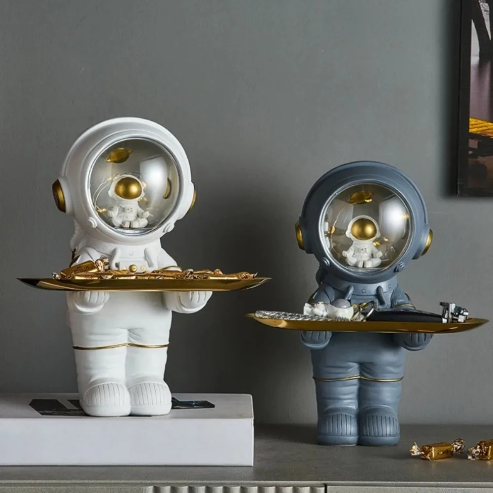 Astronaut Statue Storage Tray Resin Spaceman Sculpture Key Tray Holder Nordic Home Decor Living Room Table Figurine Ornaments
Astronaut Statue Storage Tray Resin Spaceman Sculpture Key Tray Holder Nordic Home Decor Living Room Table Figurine Ornaments