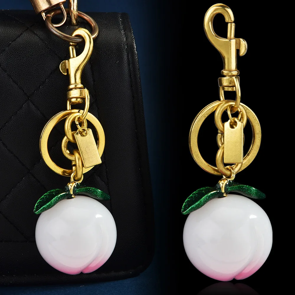 Best-selling new products: Creative resin fruit, cute peach handbag, pendant, keychain
Best-selling new products: Creative resin fruit, cute peach handbag, pendant, keychain