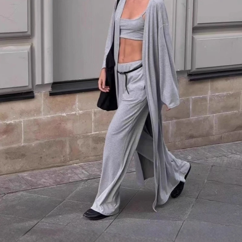 2026 European and American Lazy Style Loose Extended Cardigan and Short Skirt Suit Women's Camisole and Trousers Three-piece Set
2026 European and American Lazy Style Loose Extended Cardigan and Short Skirt Suit Women's Camisole and Trousers Three-piece Set