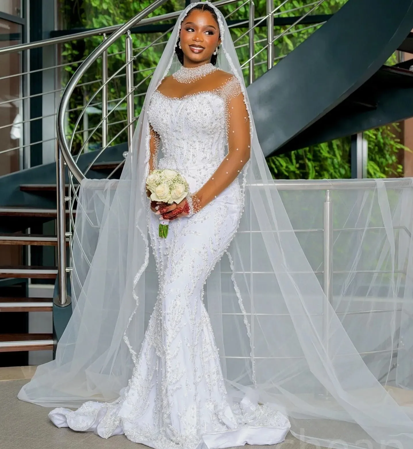 2025 Luxurious Mermaid Wedding Dress High Neck Beaded Pearls Sleeves Sequines Arabic Bride Gowns Vestidos De Noiva Customized
2025 Luxurious Mermaid Wedding Dress High Neck Beaded Pearls Sleeves Sequines Arabic Bride Gowns Vestidos De Noiva Customized