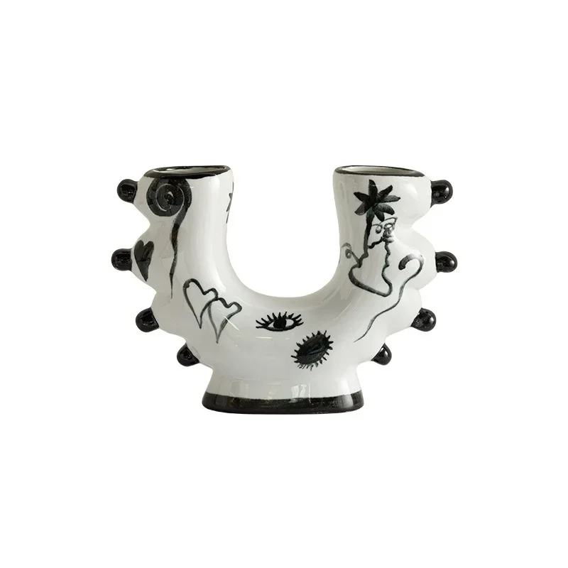 Creative Abstract Ceramic Vase U-shape Hand-painted Graffiti Ceramic Handicraft Floral Arrangement Accessories Flower Vase
Creative Abstract Ceramic Vase U-shape Hand-painted Graffiti Ceramic Handicraft Floral Arrangement Accessories Flower Vase