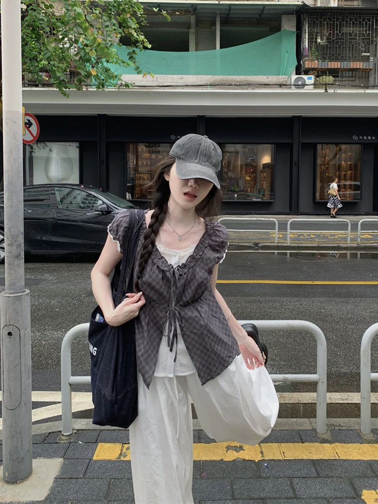 Korean Style Plaid Short Sleeve Shirt Women's Summer 2026 New Design Sense Elegant Top Wood Grain Bow Tie Fake Two-Piece
Korean Style Plaid Short Sleeve Shirt Women's Summer 2026 New Design Sense Elegant Top Wood Grain Bow Tie Fake Two-Piece