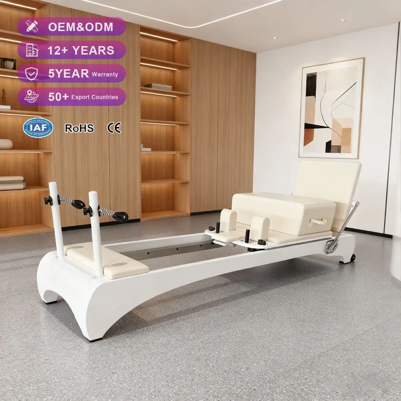 Studio Oak Wood Pilates Reformer Curved Leg Painted White Portable Wood Pilates Reformer Bed
Studio Oak Wood Pilates Reformer Curved Leg Painted White Portable Wood Pilates Reformer Bed