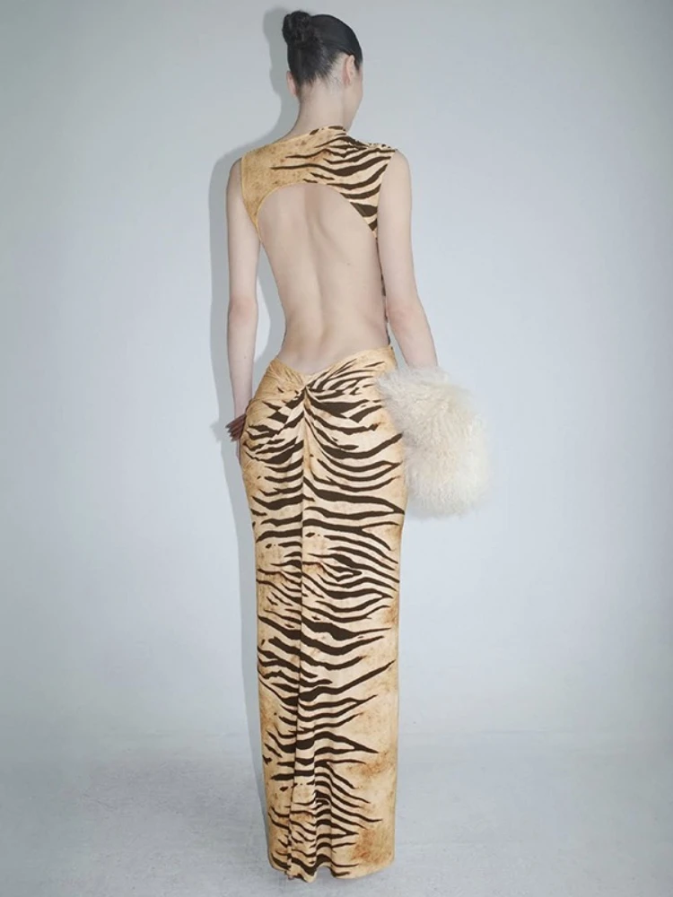 FDYOUI 2026 Chic Zebra-stripe Printed Long Dress Women Sexy O-neck Sleeveless Backless Slim Holiday Beach Dresses Party Clubwear
FDYOUI 2026 Chic Zebra-stripe Printed Long Dress Women Sexy O-neck Sleeveless Backless Slim Holiday Beach Dresses Party Clubwear