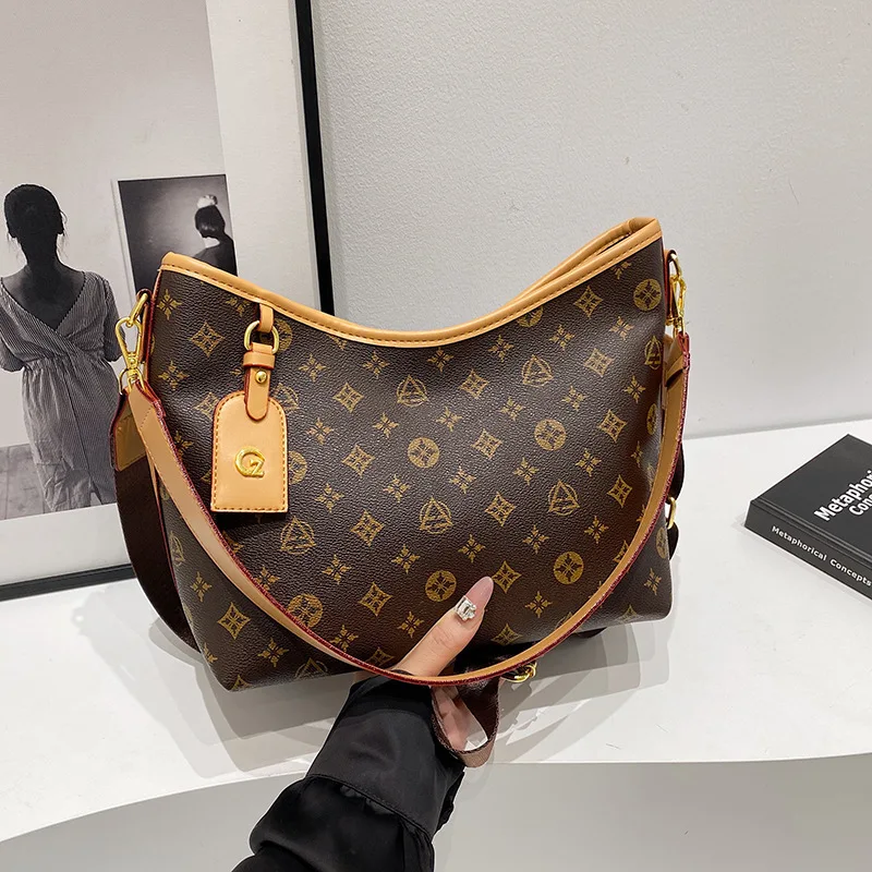 Ladies' high-end large capacity handbag, vintage armpit classic handbag, shoulder bag, diagonal cross ladies' bag
Ladies' high-end large capacity handbag, vintage armpit classic handbag, shoulder bag, diagonal cross ladies' bag